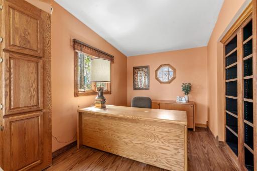 Whether it becomes your home office with a lake-property view, a cozy library, or a dedicated hobby room, it brings warmth and purpose to every use.