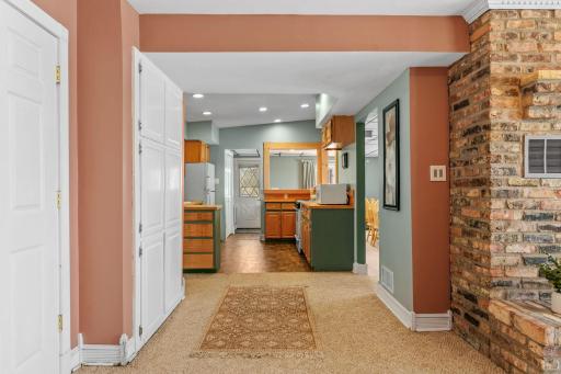This is a warm, well-connected home where the kitchen, living areas, and fireplace all flow together naturally.