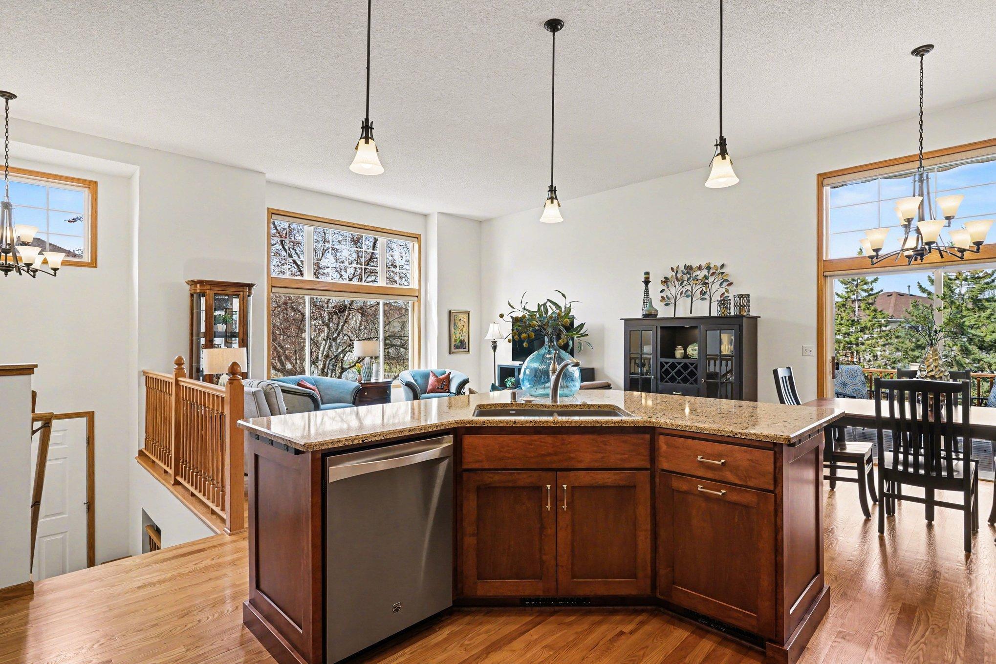 View from the kitchen into the living and dining room.