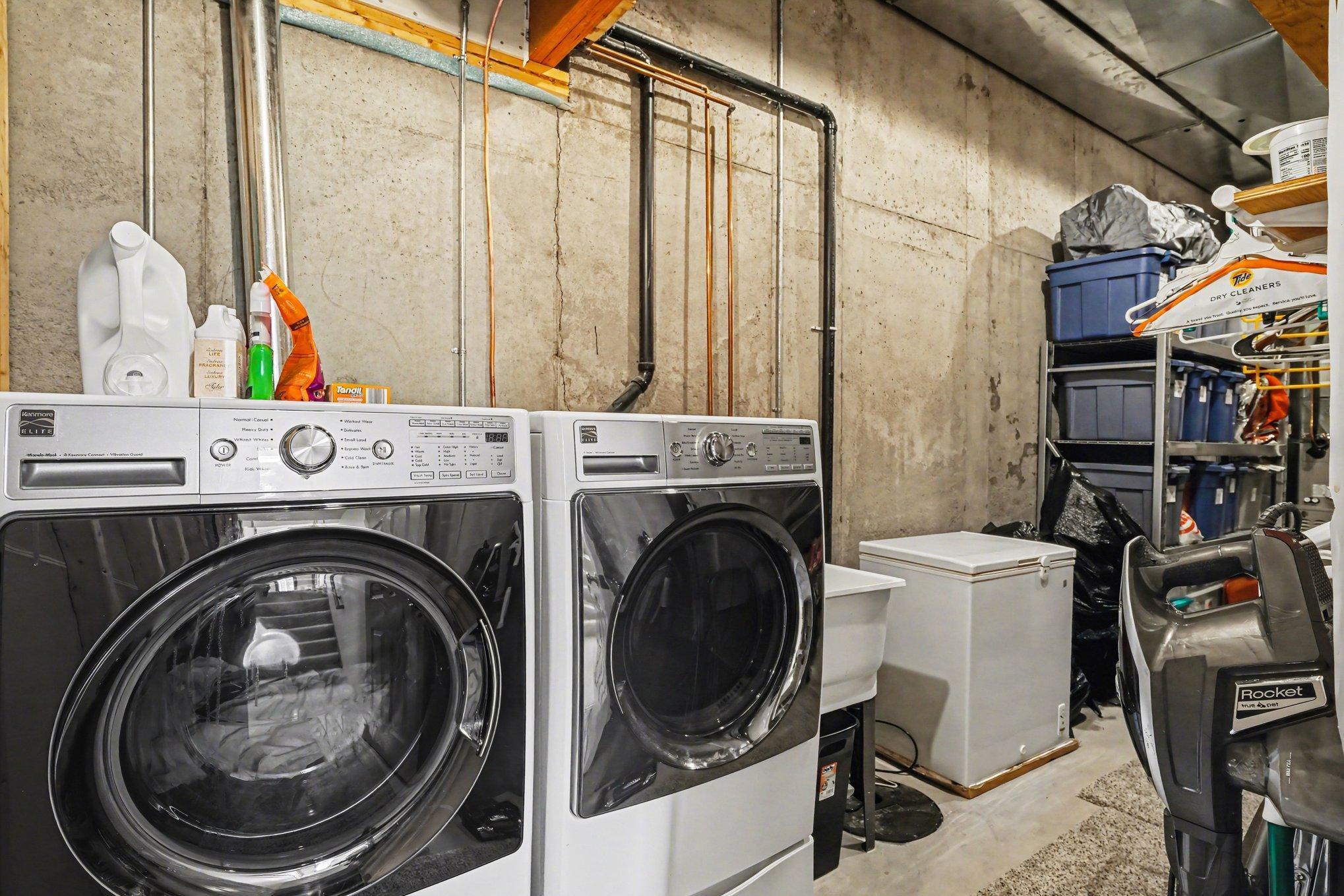 Laundry Room has a sink. The mechanicals and storage finish off the lower level.