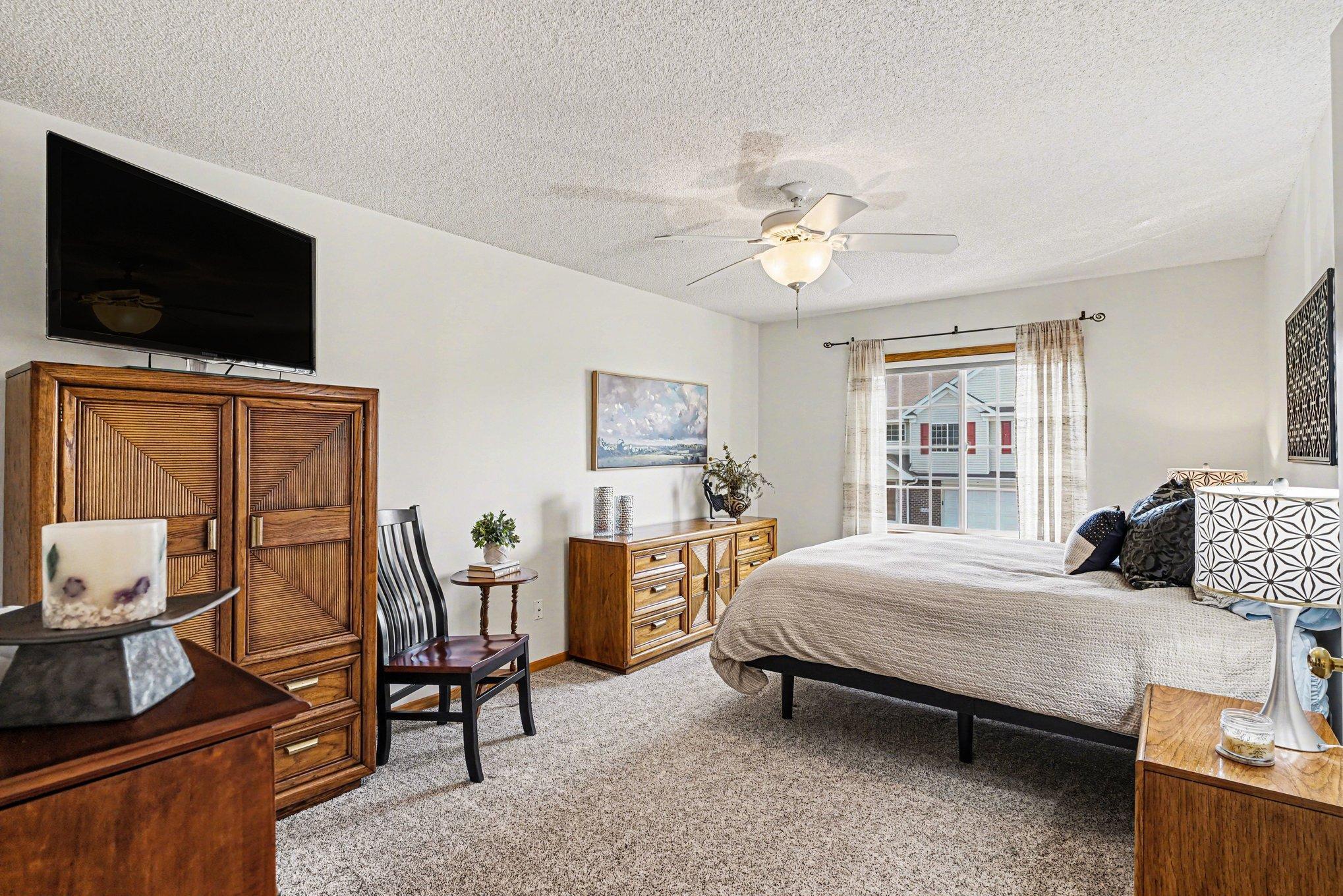 The primary bedroom is only a few steps up from the main level. The bedroom has recently been painted.