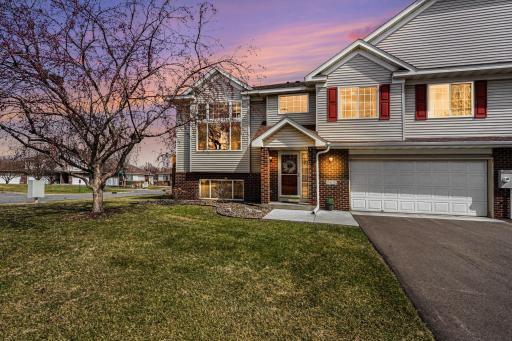 So much curb appeal with the brick accents and cement sidewalk.