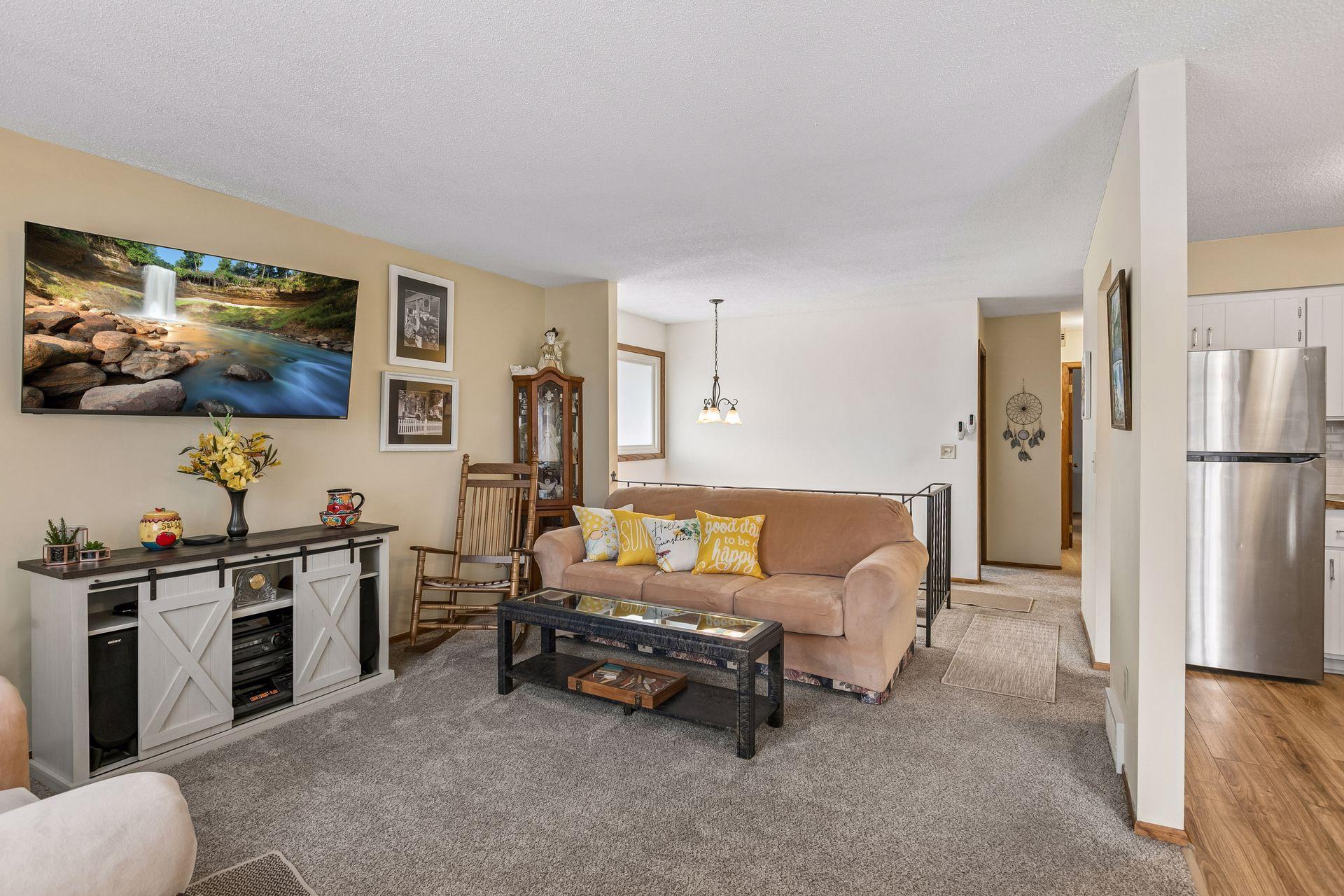 Living room with kitchen off to the right