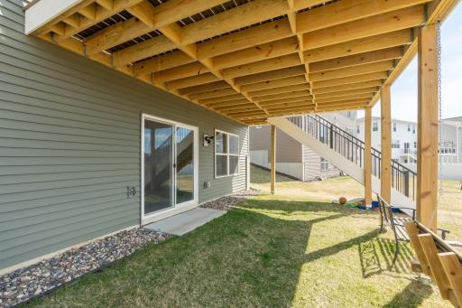 Covered lower-level patio with walkout access