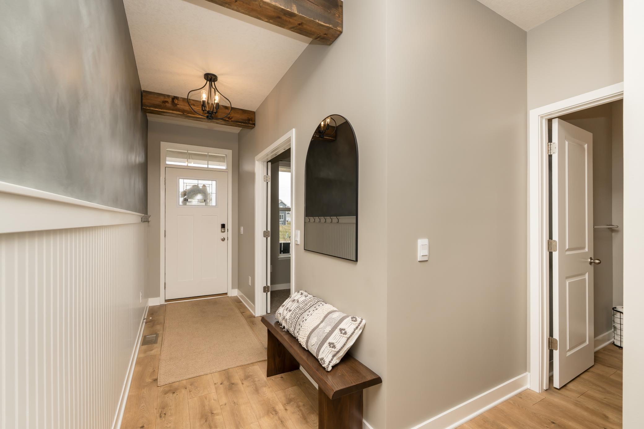Your grand entry way with wood beams