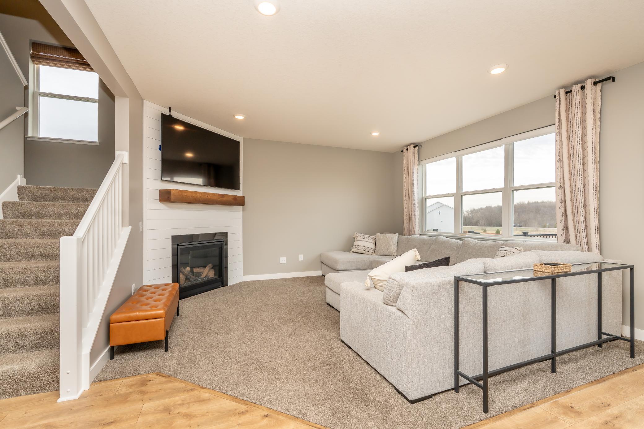 Main level living - very bright and open with gas fireplace