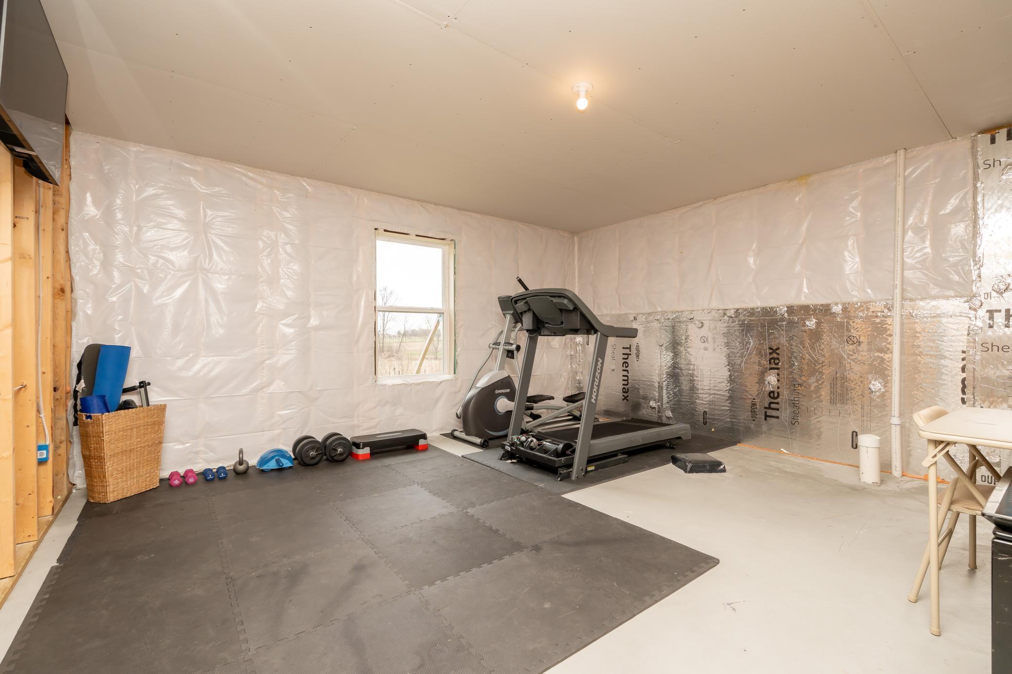 Unfinished - could be 6th bedroom/flex space or kept as a workout area.
