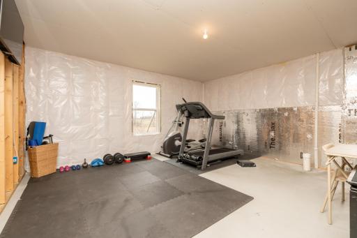 Unfinished - could be 6th bedroom/flex space or kept as a workout area.