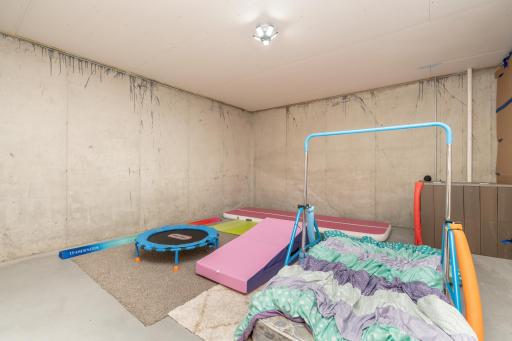 Huge storage area or kept as a kids gym space, or maybe a movie room