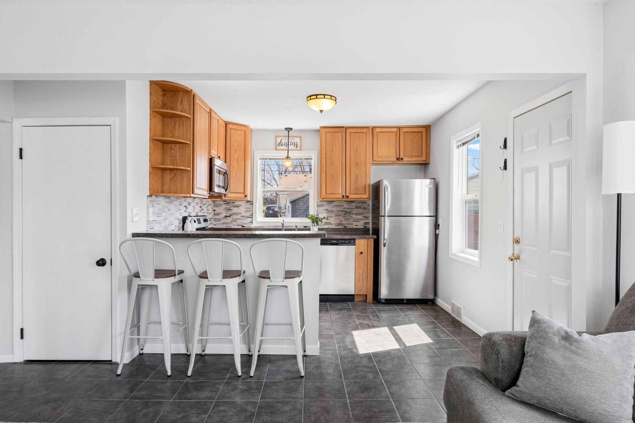 Beautifully updated kitchen with breakfast bar.
