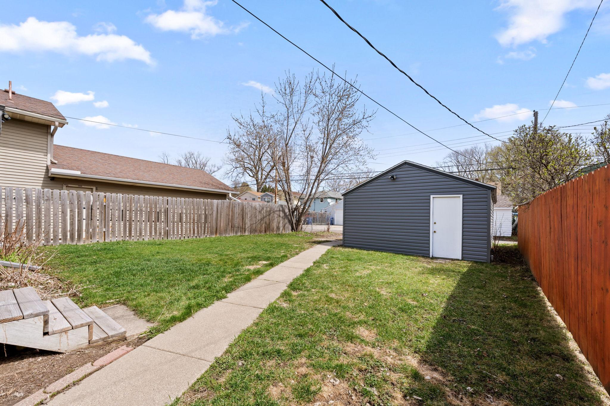 Outside, enjoy a partially fenced backyard for added privacy, along with a spacious 1.5-car garage for extra storage and convenience.