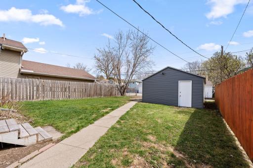 Outside, enjoy a partially fenced backyard for added privacy, along with a spacious 1.5-car garage for extra storage and convenience.
