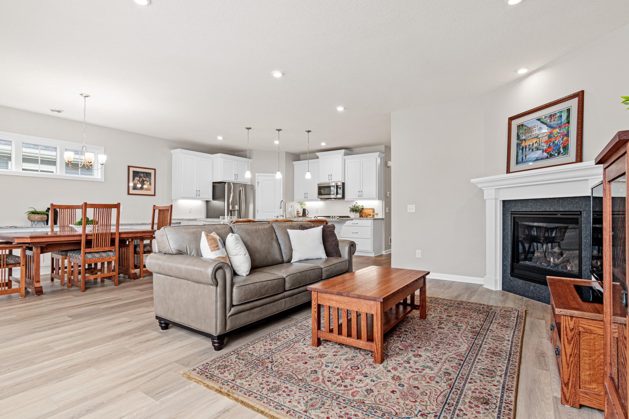Large gas fireplace with mantle.