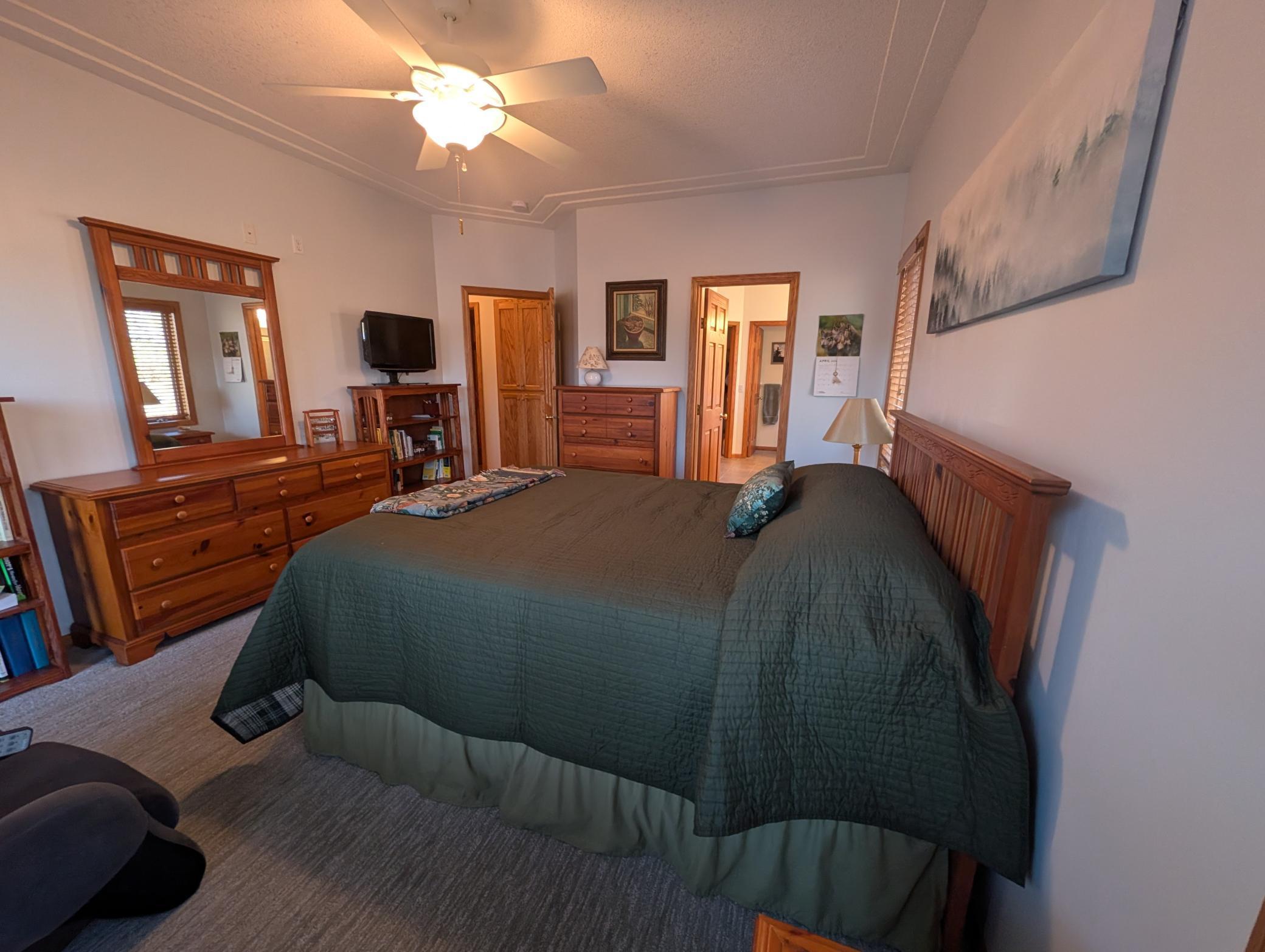 Primary bedroom with ensuite and a door to the deck