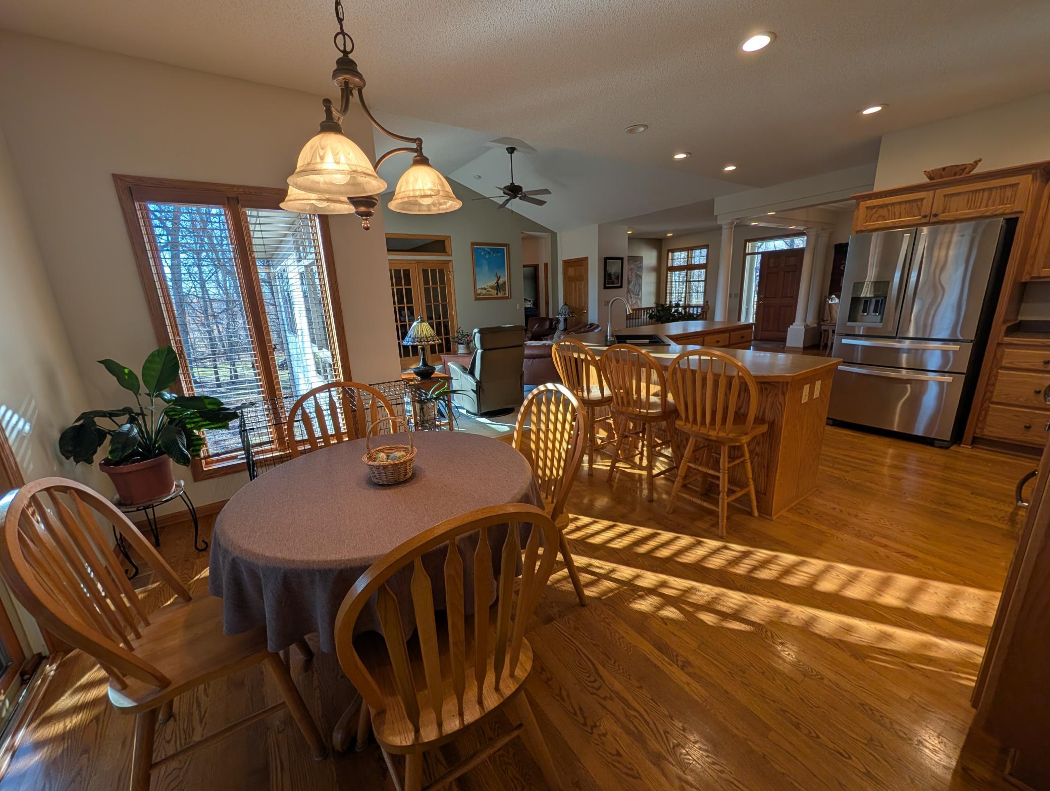 Dinette nook off of kitchens with large windows. Plenty of spaces for family, friends and entertaining