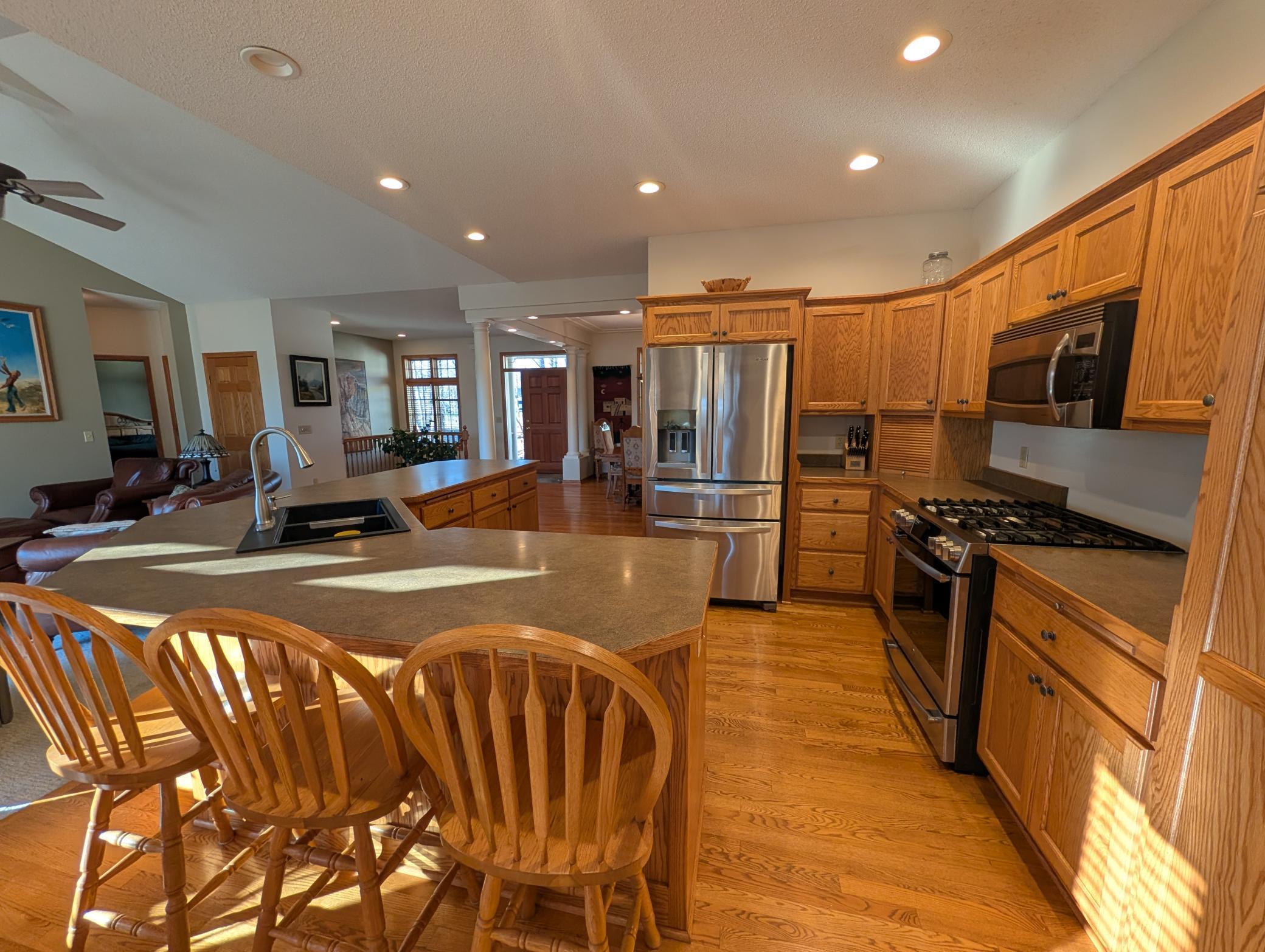 Large and open kitchen with stainless steel appliances