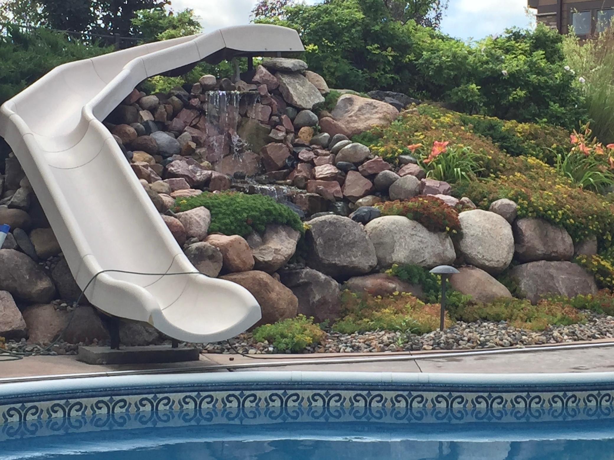 Enjoy the laughter of EVERYONE sliding down the 30 foot slide!