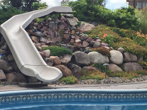 Enjoy the laughter of EVERYONE sliding down the 30 foot slide!