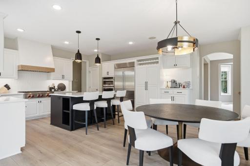 Cabinets galore and a marvelous walk-in pantry, enjoy a coffee bar