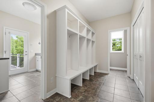 Marvelous mudroom with lockers and separate coat closet