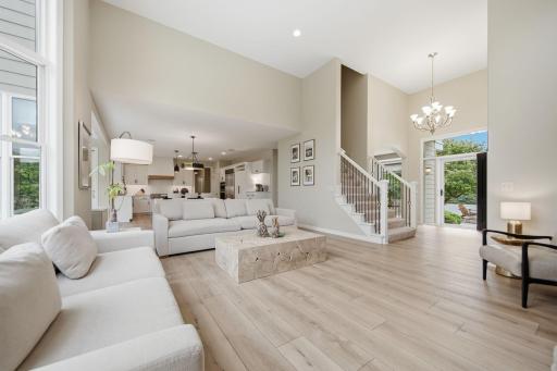 Gleaming light through all the huge windows make this home light and airy