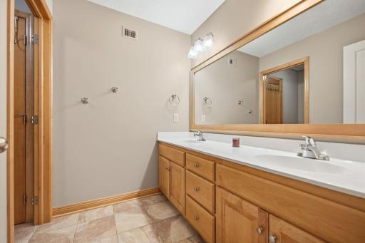 Upstairs bath with dual sinks and large mirror
