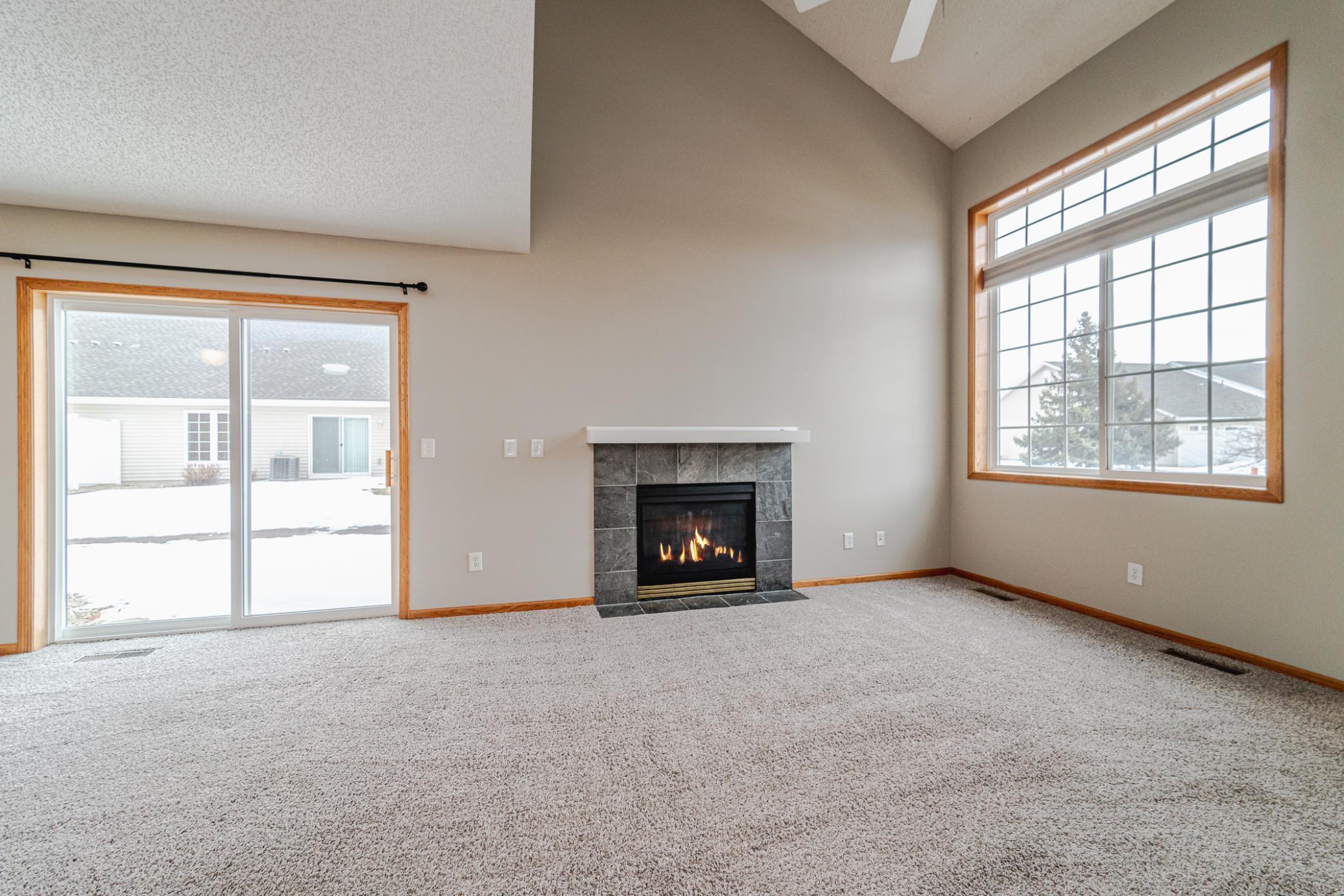 The paint is neutral and the carpet is clean.