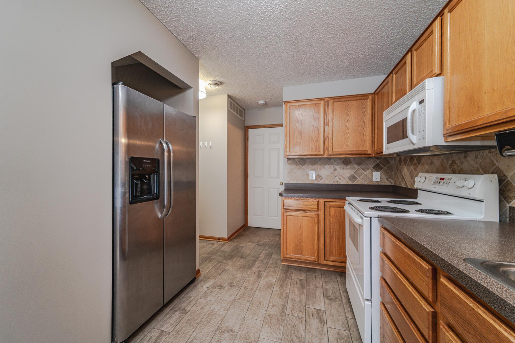 The refrigerator is stainless.