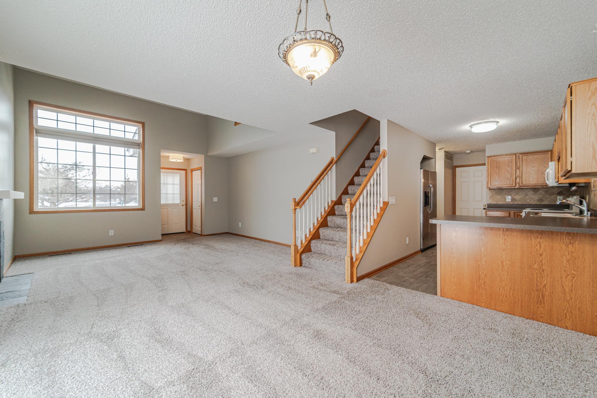 Open floor plan, with a central stair