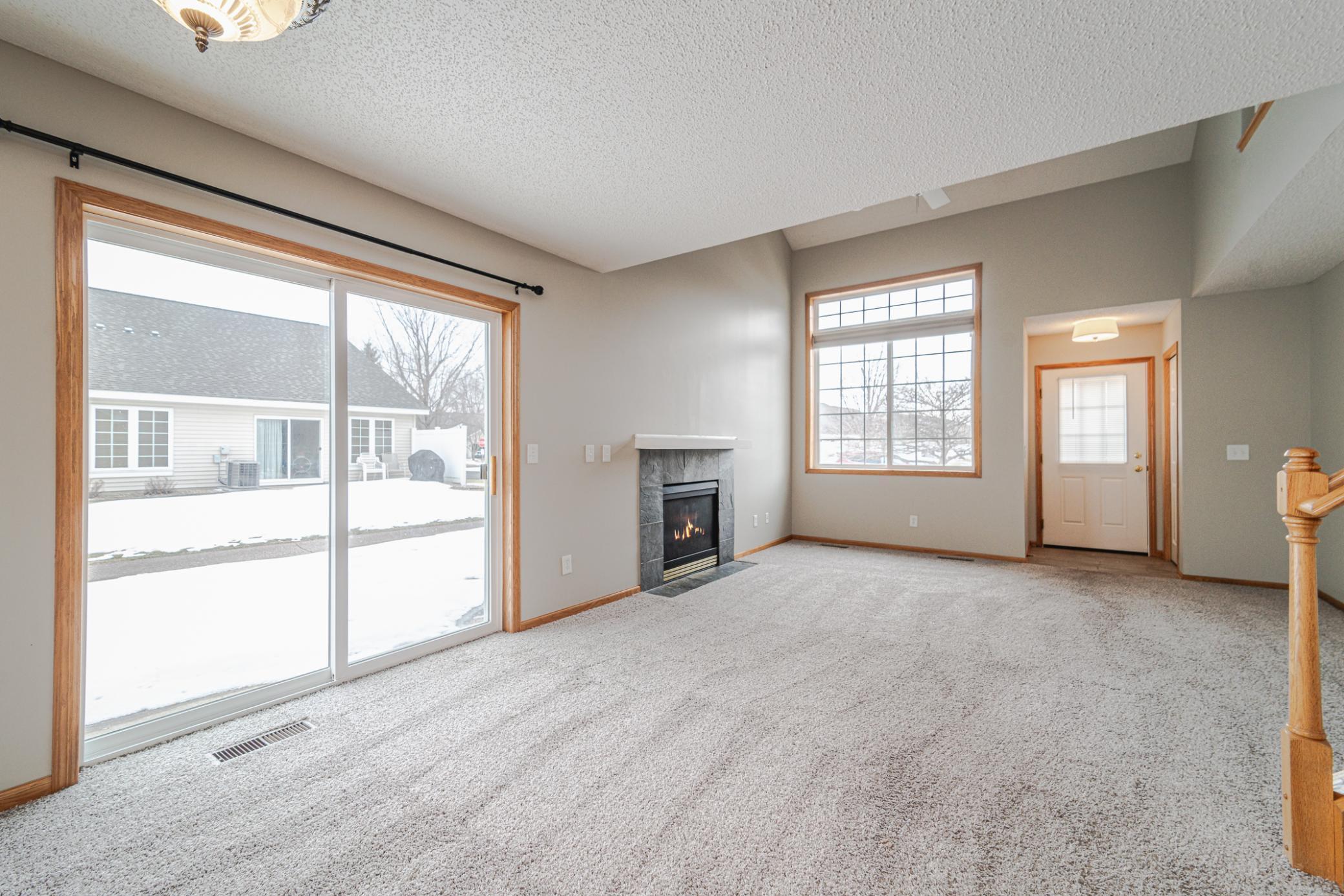 View of the living room from the dining room space.