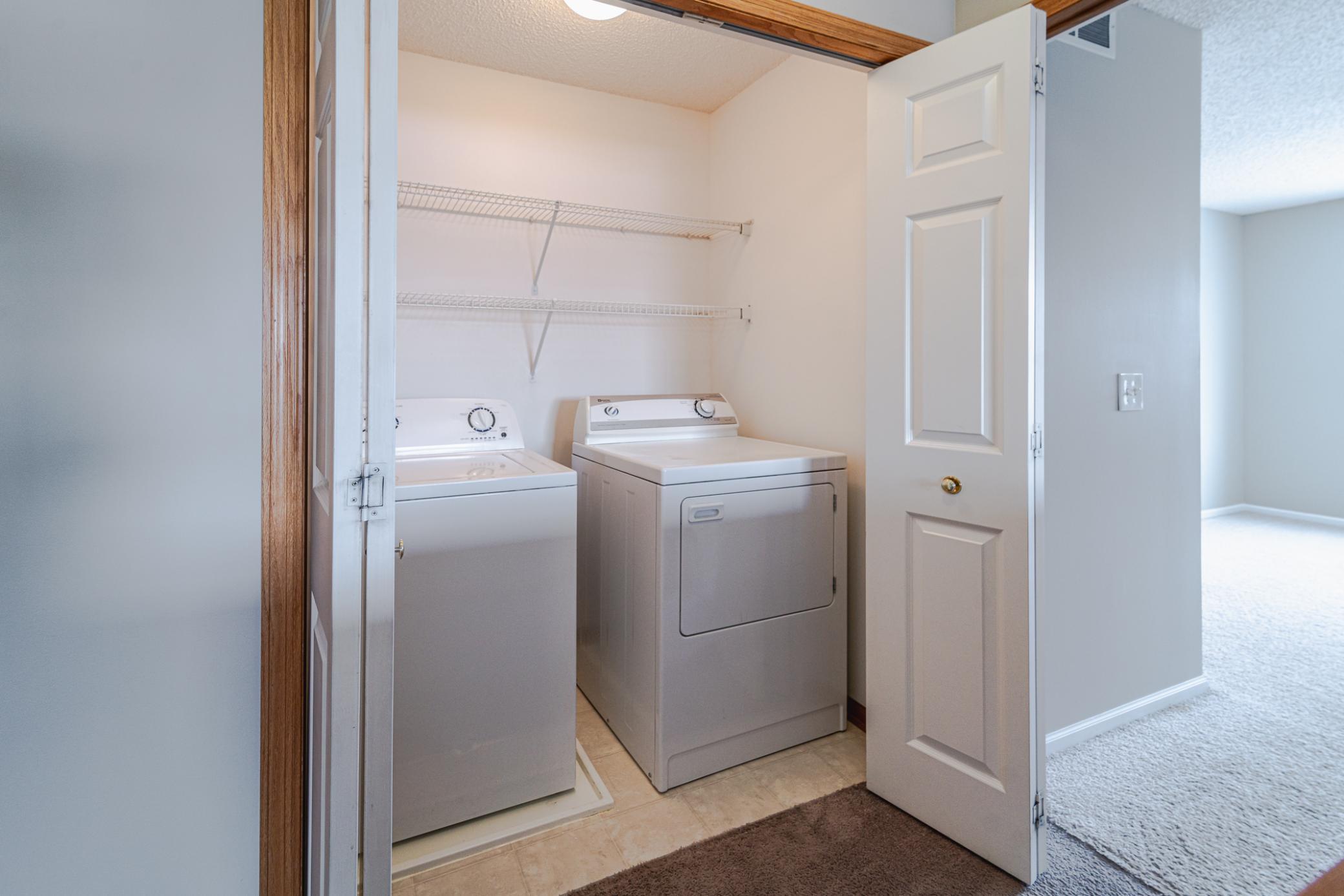 Upper level laundry, conveniently located off the bedrooms.