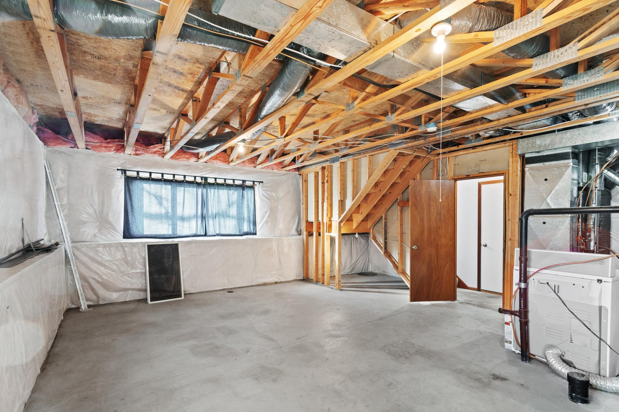 Lower level: unfinished family room area and rough in for bathroom (can also add a 3rd bedroom)