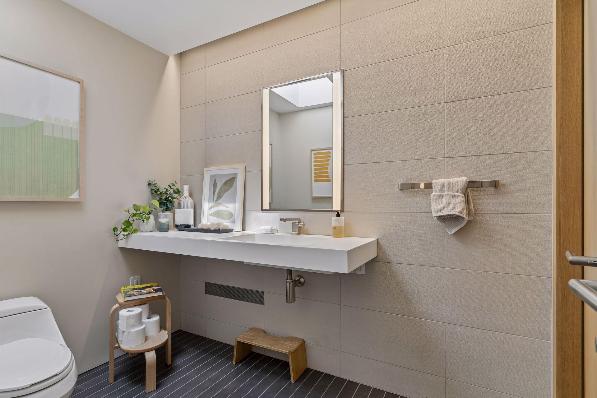 Guest's bathroom has custom italian tile with heated floors.