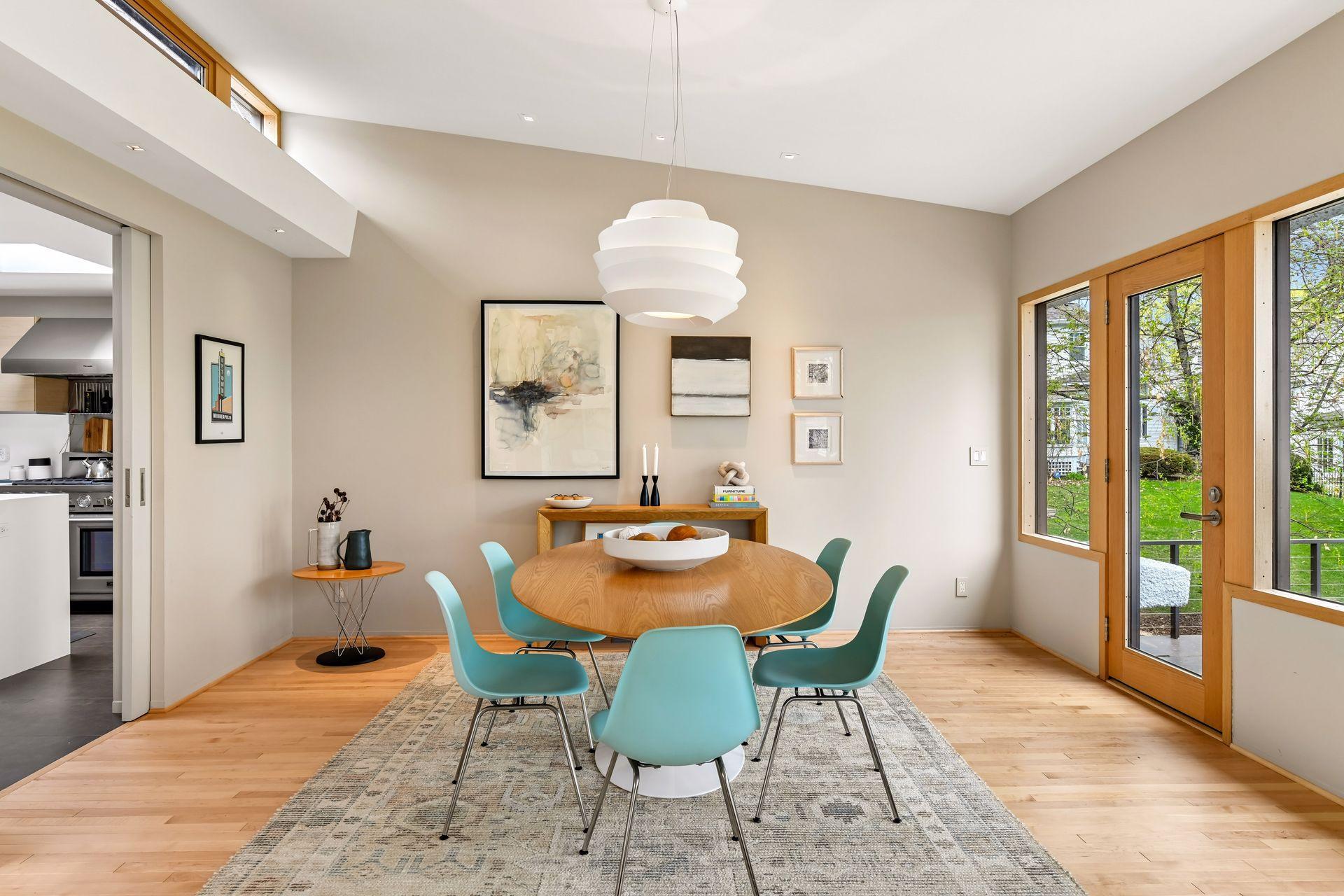 Dining room has connected oversized deck with amazing views of the lake.