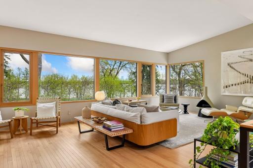 Expansive windows showcase the landscaping and extraordinary views.