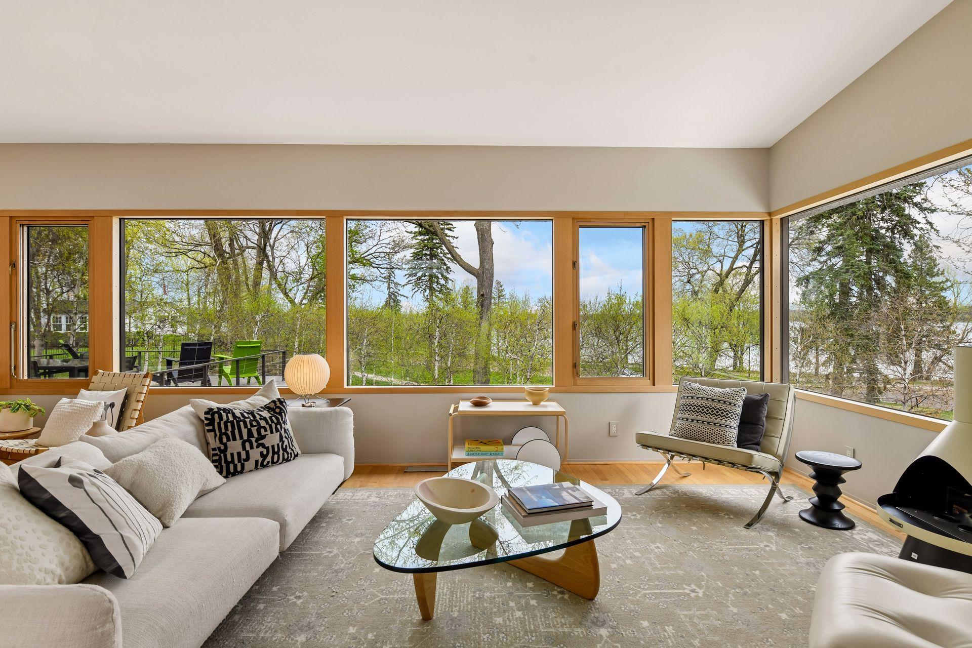Expansive windows showcase the landscaping and extraordinary views.