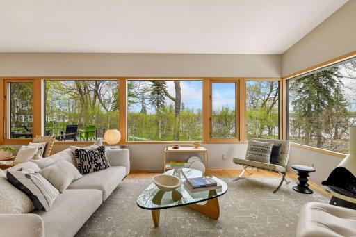 Expansive windows showcase the landscaping and extraordinary views.