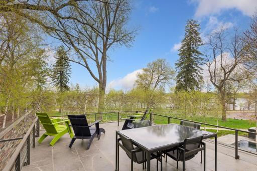 Breathtaking views of reflective pool, birch trees, Minneapolis skyline and Bde Maka Ska.