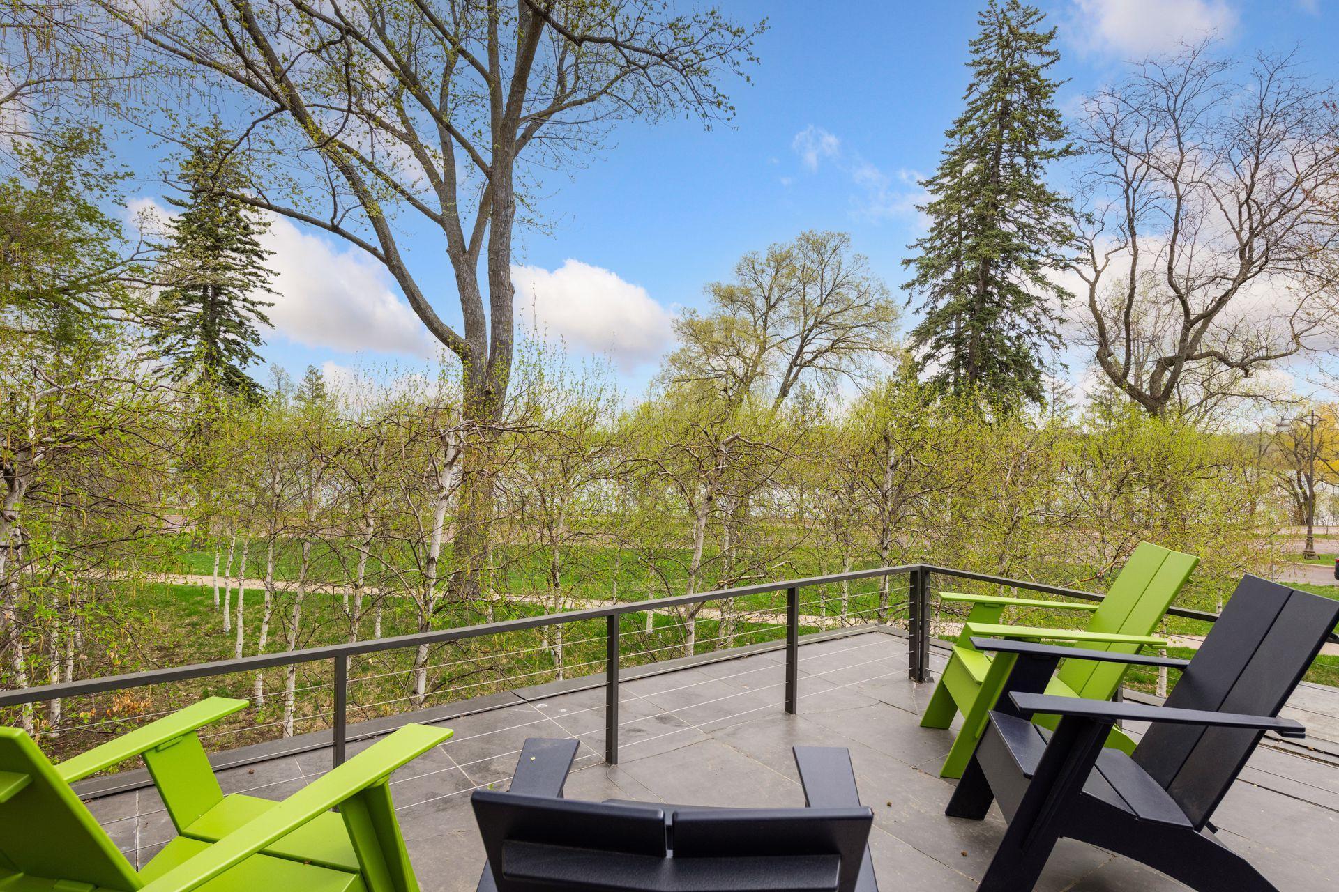 Breathtaking views of reflective pool, birch trees, Minneapolis skyline and Bde Maka Ska.