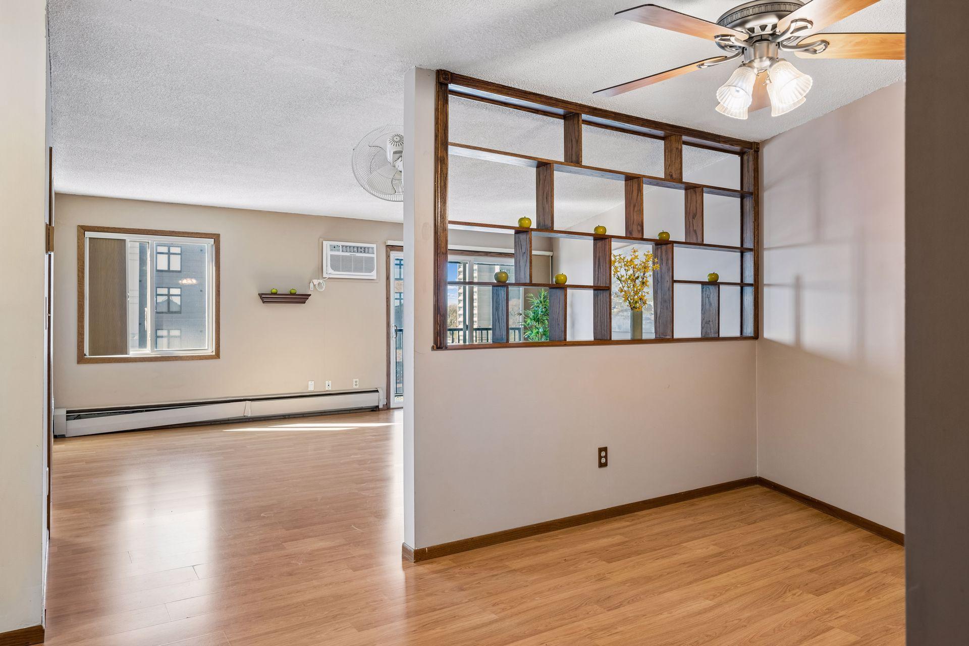 Facing from front entrance toward the dining and living rooms areas.