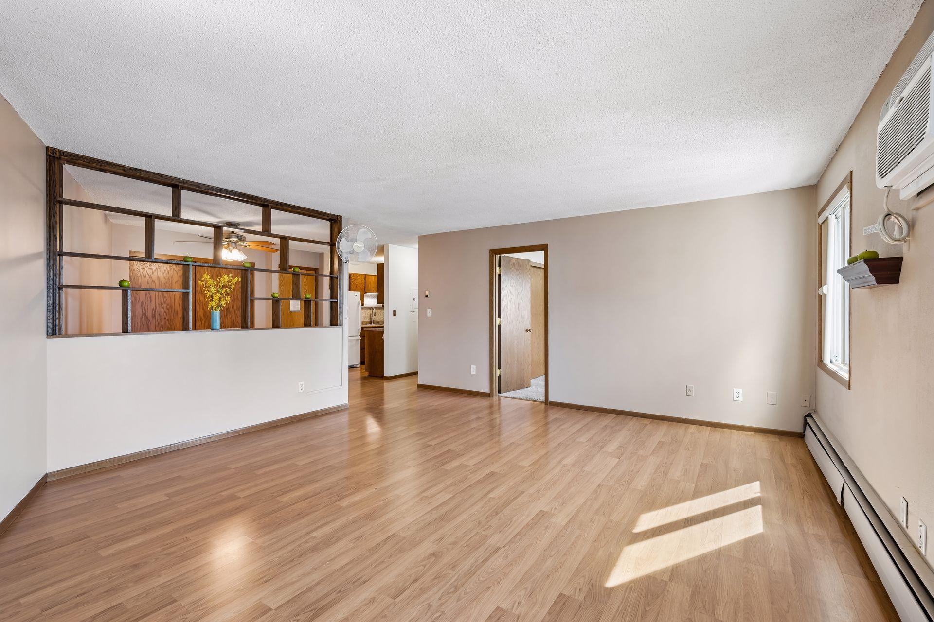 View from balcony area towards the door of first bedroom.
