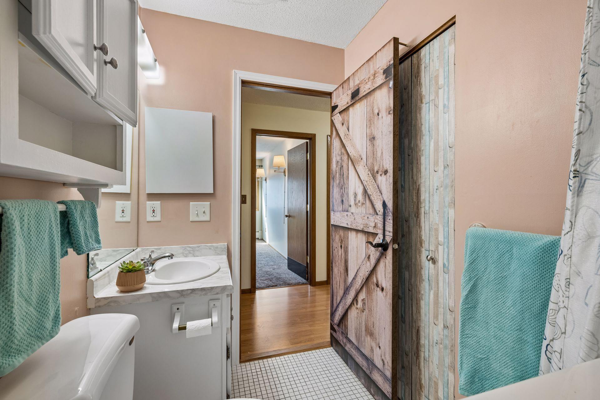 Guest Bathroom is convenient to Bedroom One.
