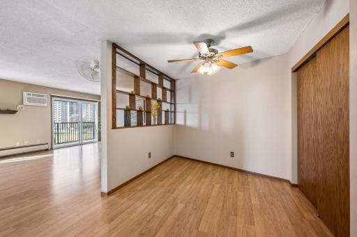 You'll love this light and bright space! Unique, decorative wall between dining area and living room.