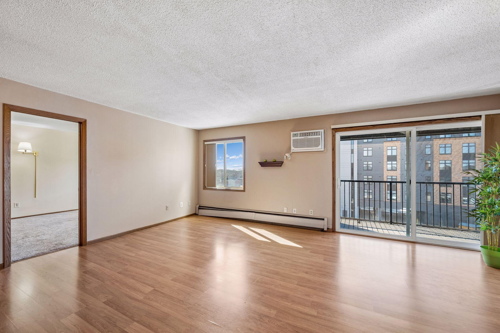 First bedroom to the left and patio doors to screened in balcony on the right.