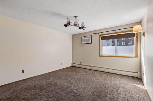Primary bedroom with ensuite bathroom and two closets.