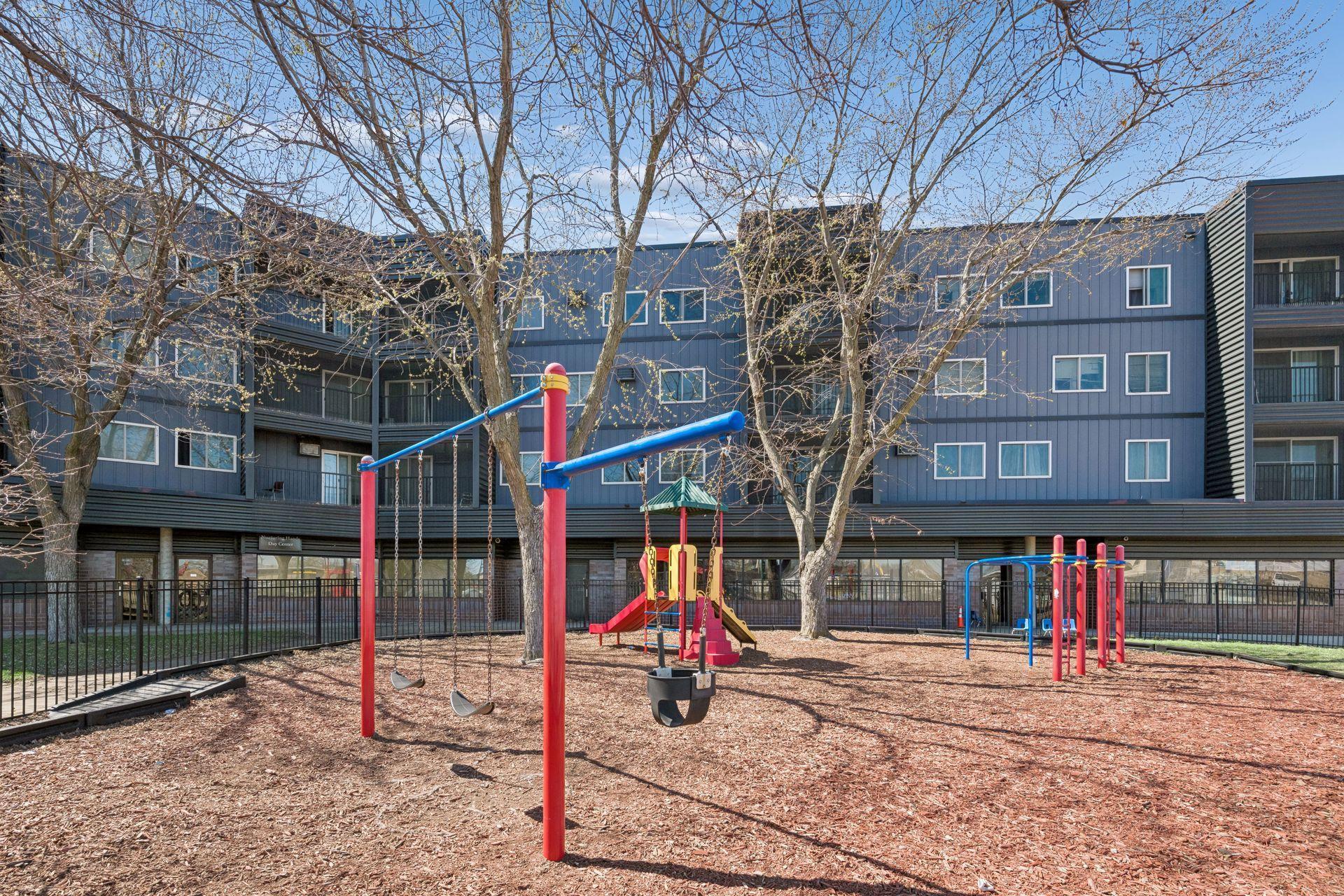 There is a daycare on the main floor of the building with an outdoor playground!