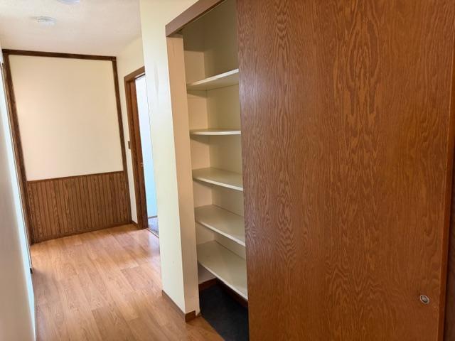 There is a large in-unit closet in the hallway located between the two bedrooms.