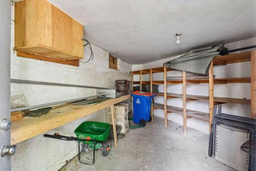 Dry storage room located next to the deck and lower level workshop walkout door - perfect for storing patio furniture.
