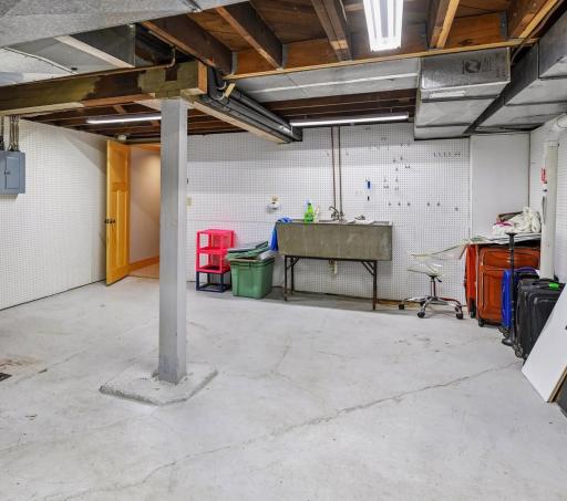 Lower Level Storage Room & Newer Radon Mitigation System