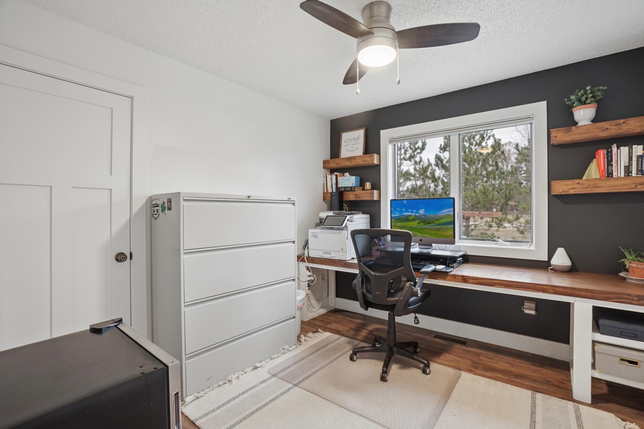 Main floor bedroom can double as a home office if needed! Perfect for those who work from home or homeschool!